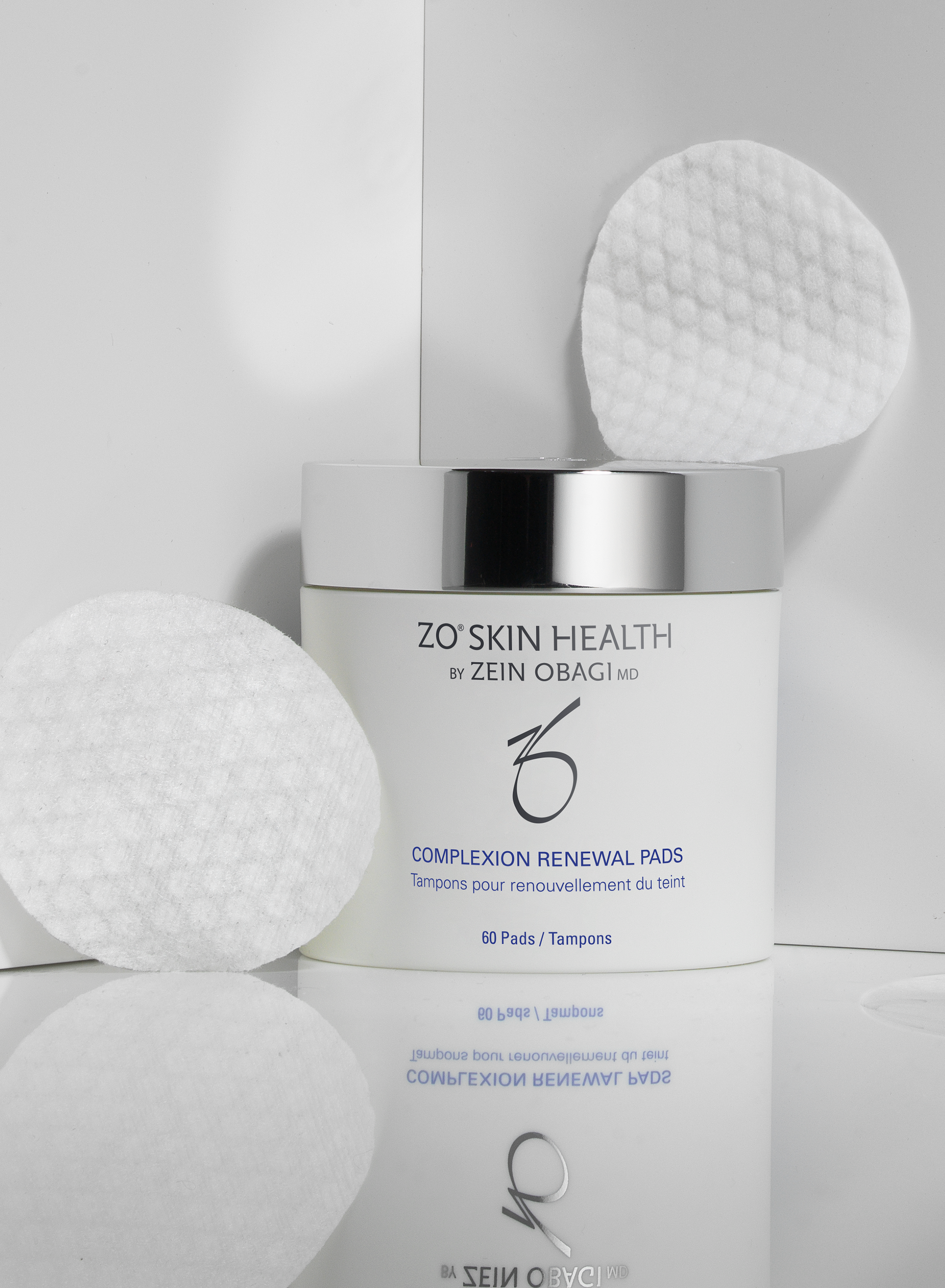 ZO Skin Health Complexion Renewal Pads packaging with applicator on a light gray background